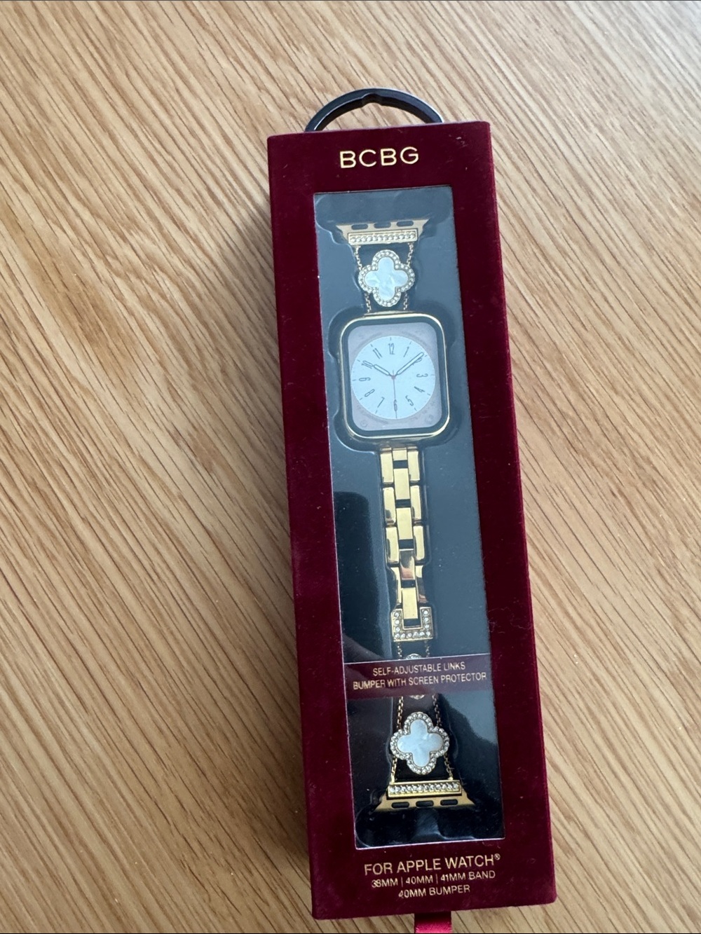 BCBG Gold and White Enamel Clover Bracelet Apple Watch Band